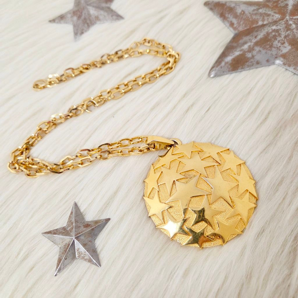 Vintage signed Trifari gold star celestial necklace pendant statement medallion